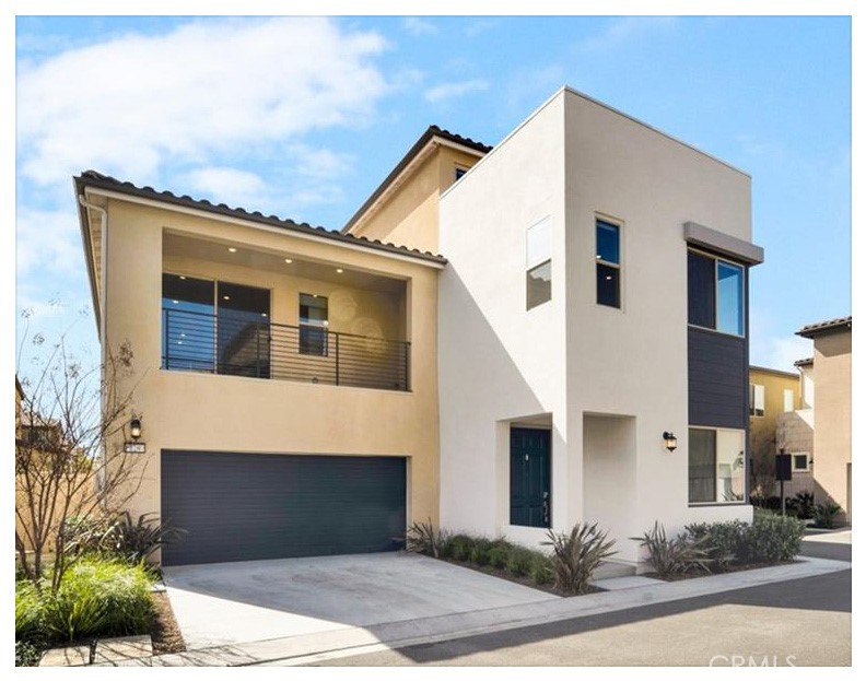 129 Denali Lake Forest, CA 92630 - Photo 1 of 1 a front view of a house with a garden