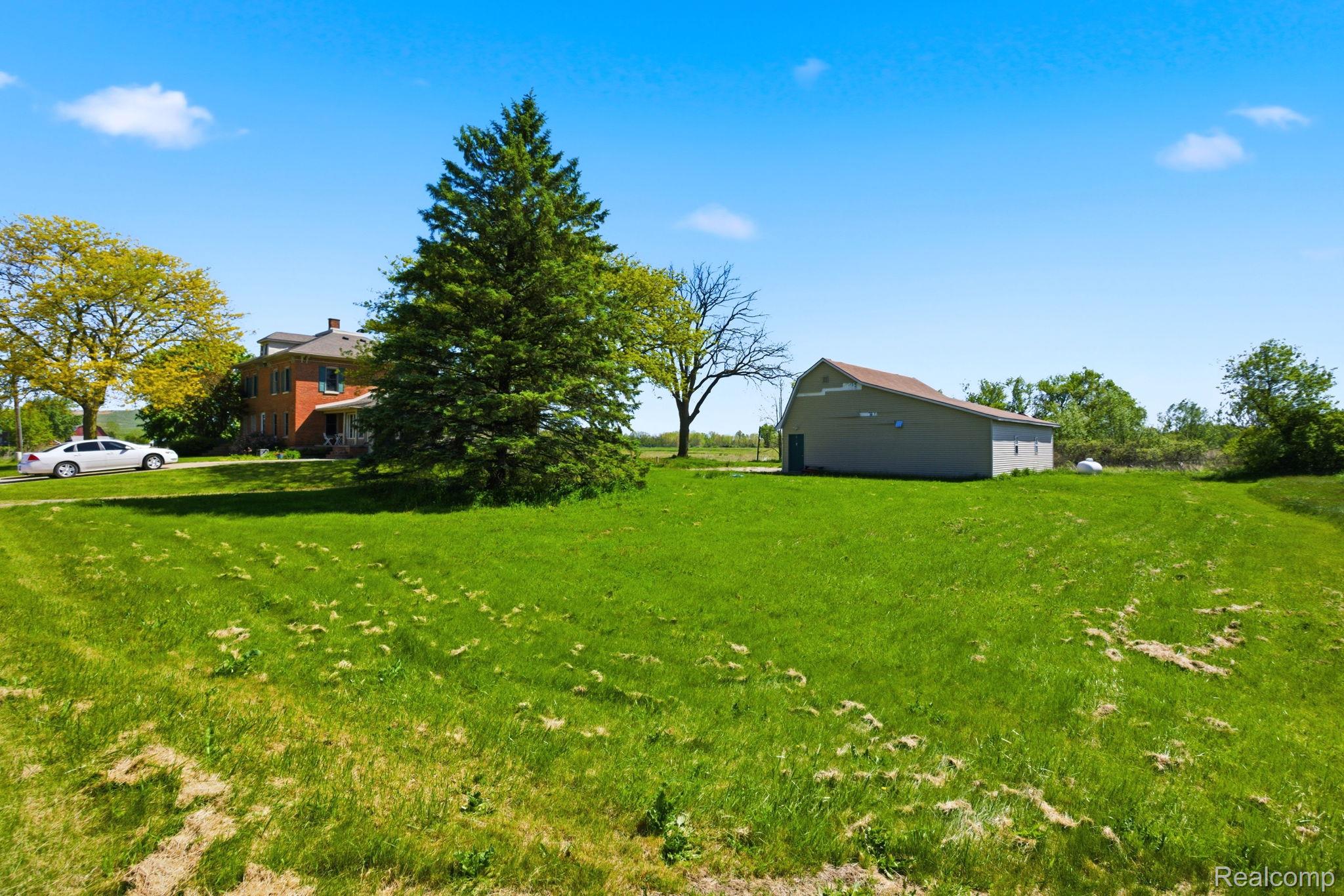 14104 Carleton West Road Carleton, MI 48117 - Photo 52 of 58 View of grassy yard