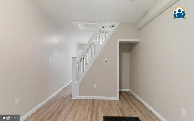 a view of entryway with wooden floor