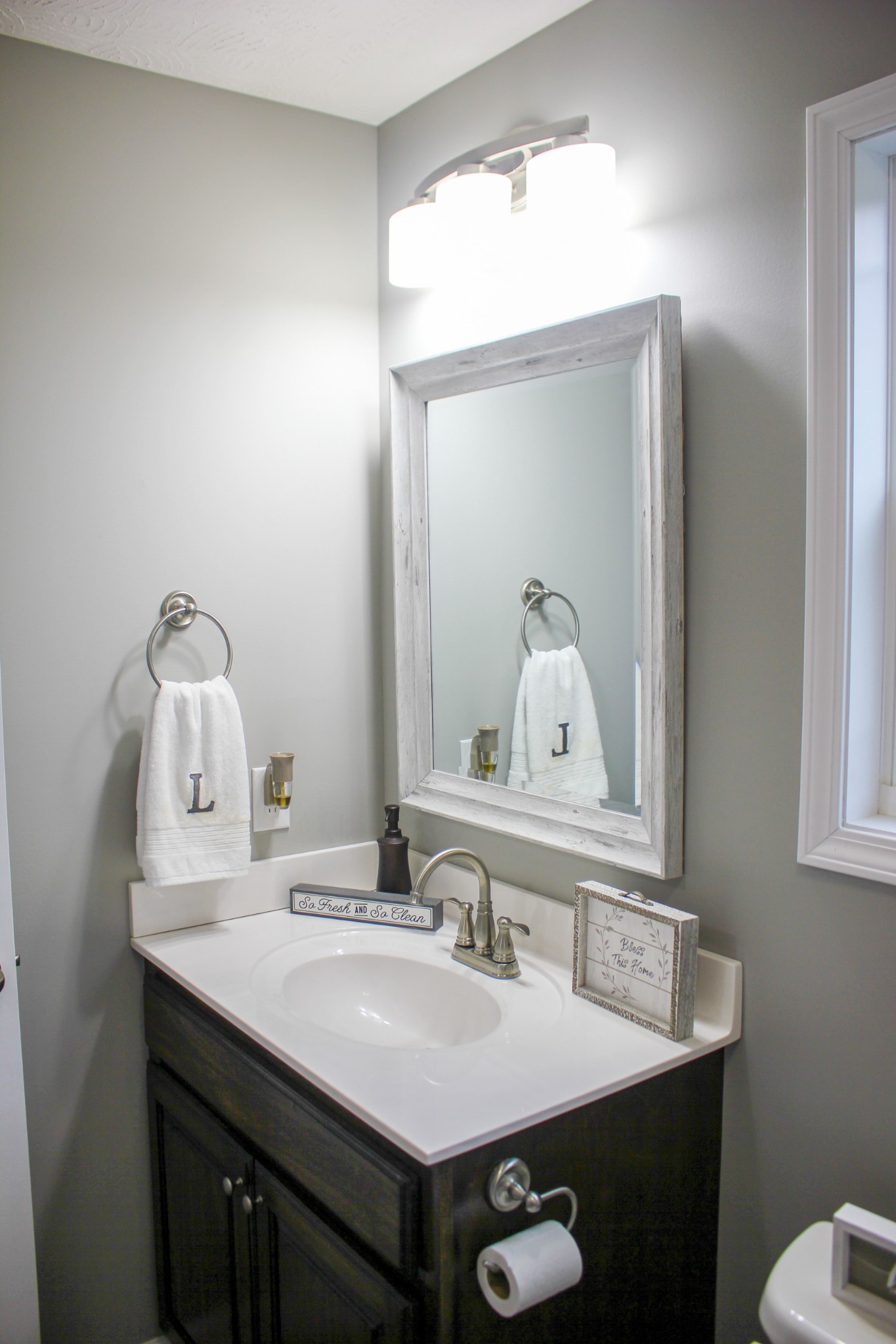 1751 Taurus Farm Road Lafayette, TN 37083 - Photo 22 of 25 a bathroom with a sink and a mirror