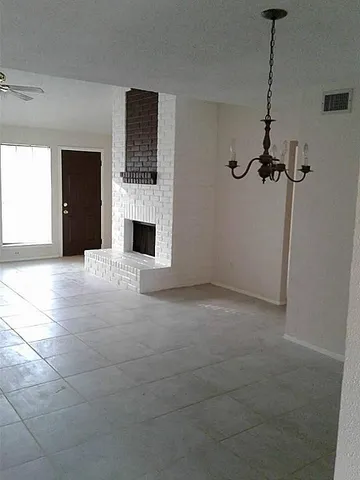 a view of a livingroom with a fireplace