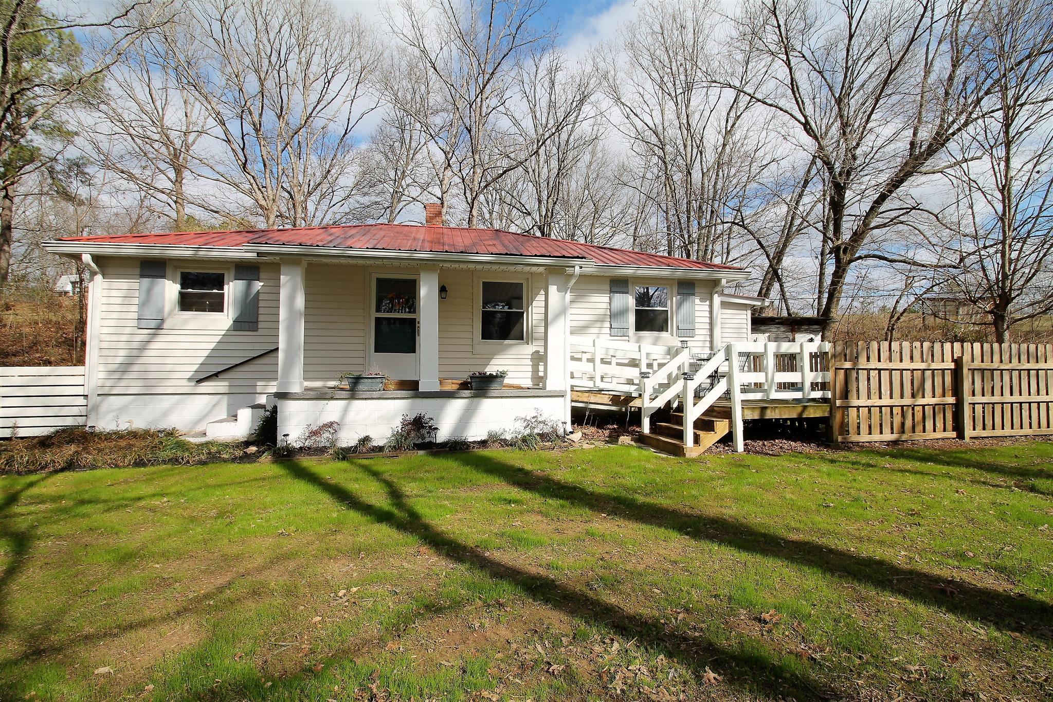 7205 Sleepy Hollow Road Fairview, TN 37062 - Photo 1 of 26 a view of a house with backyard porch and sitting area