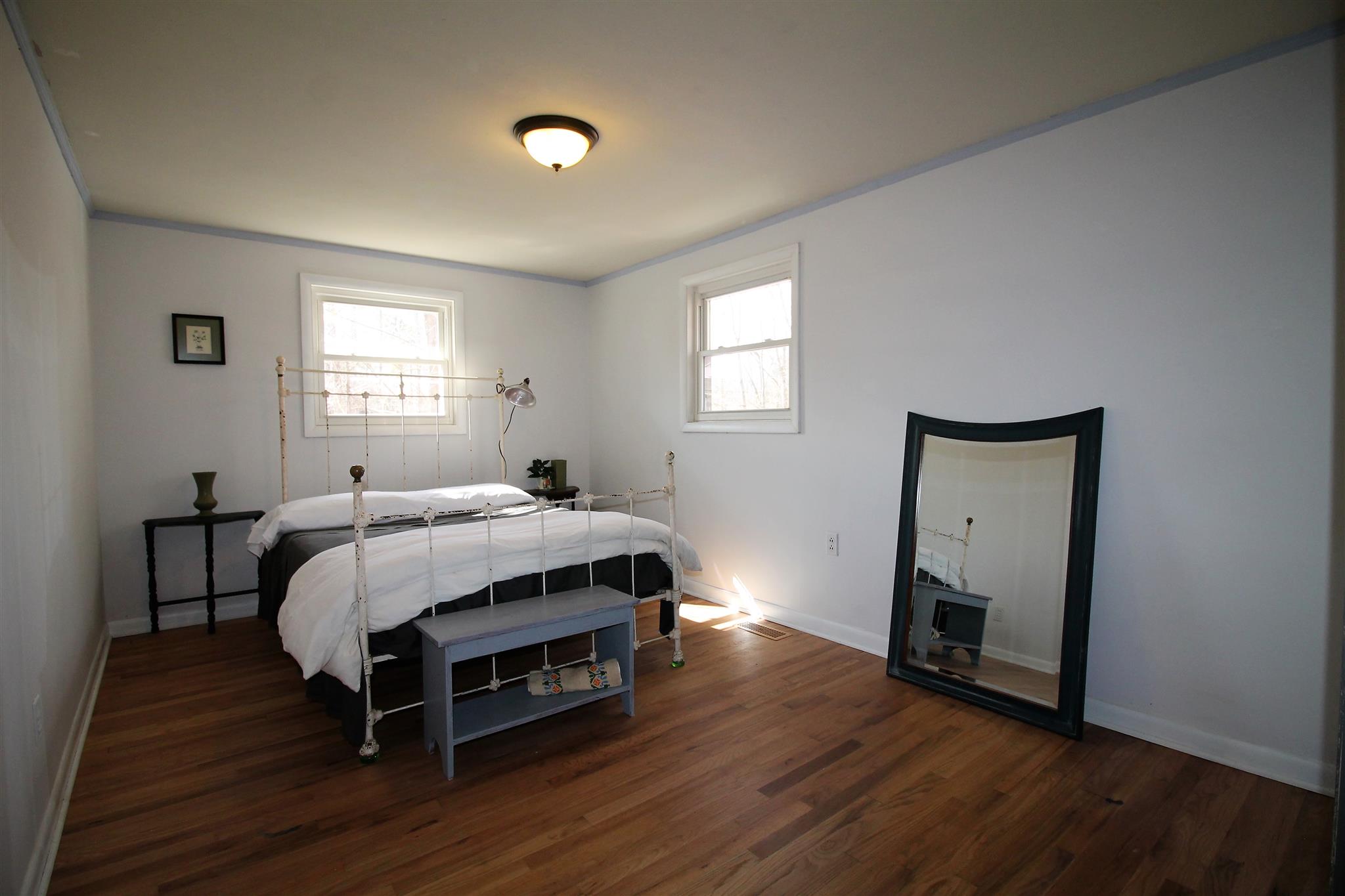 7205 Sleepy Hollow Road Fairview, TN 37062 - Photo 12 of 26 a bed room with a bed and a window