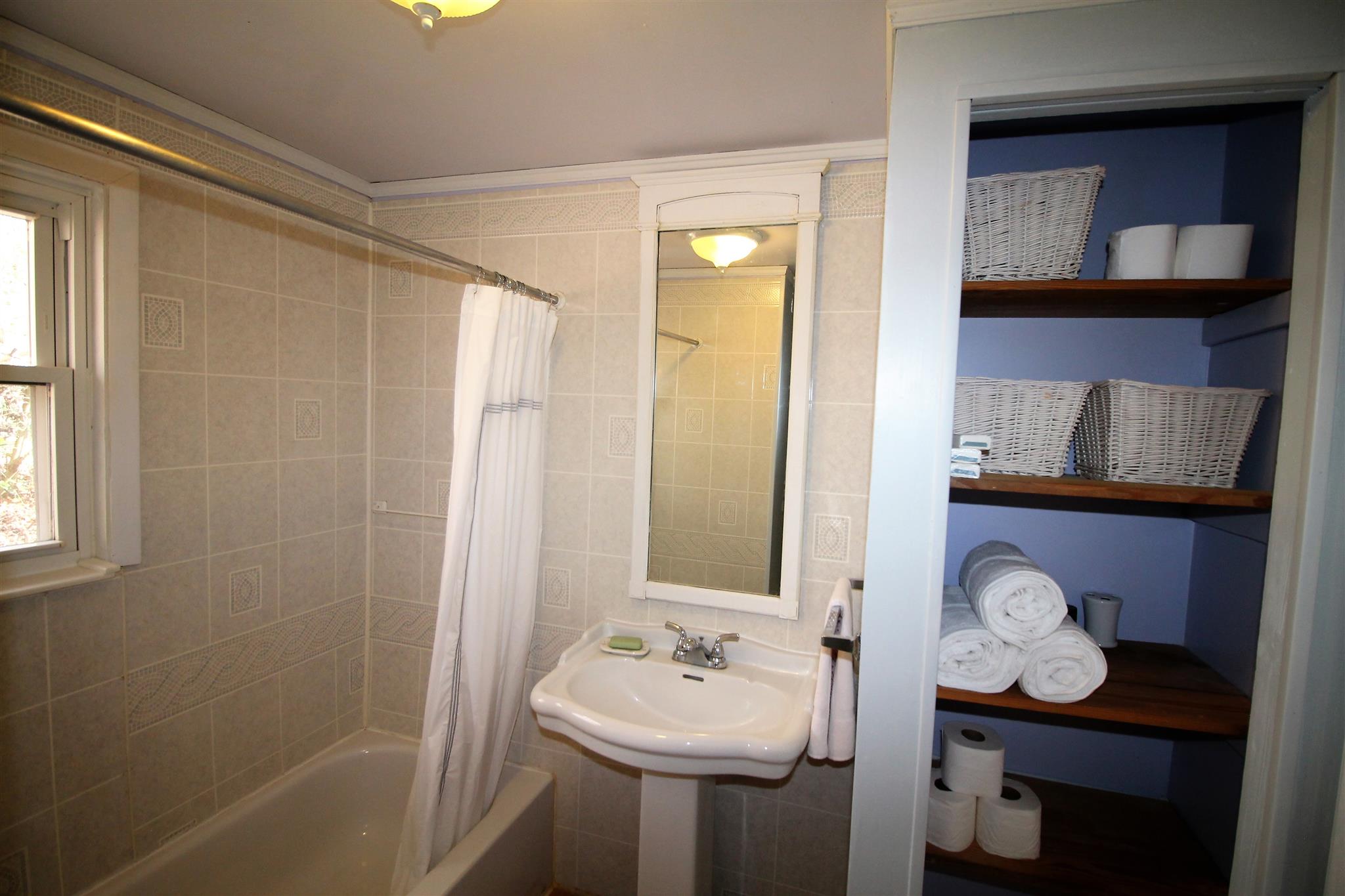 7205 Sleepy Hollow Road Fairview, TN 37062 - Photo 14 of 26 a bathroom with a sink mirror vanity and toilet
