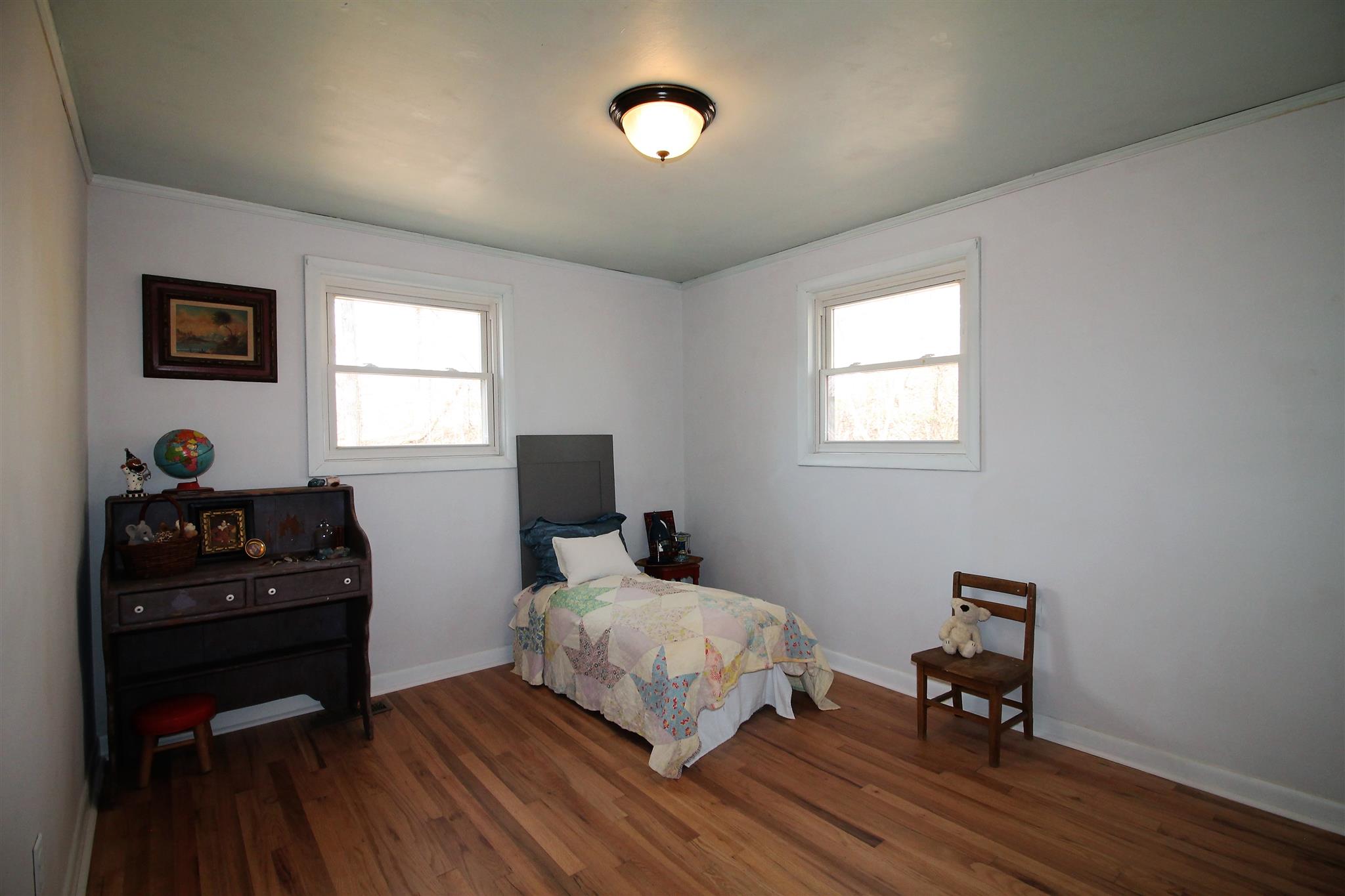 7205 Sleepy Hollow Road Fairview, TN 37062 - Photo 17 of 26 a bedroom with a bed and a window