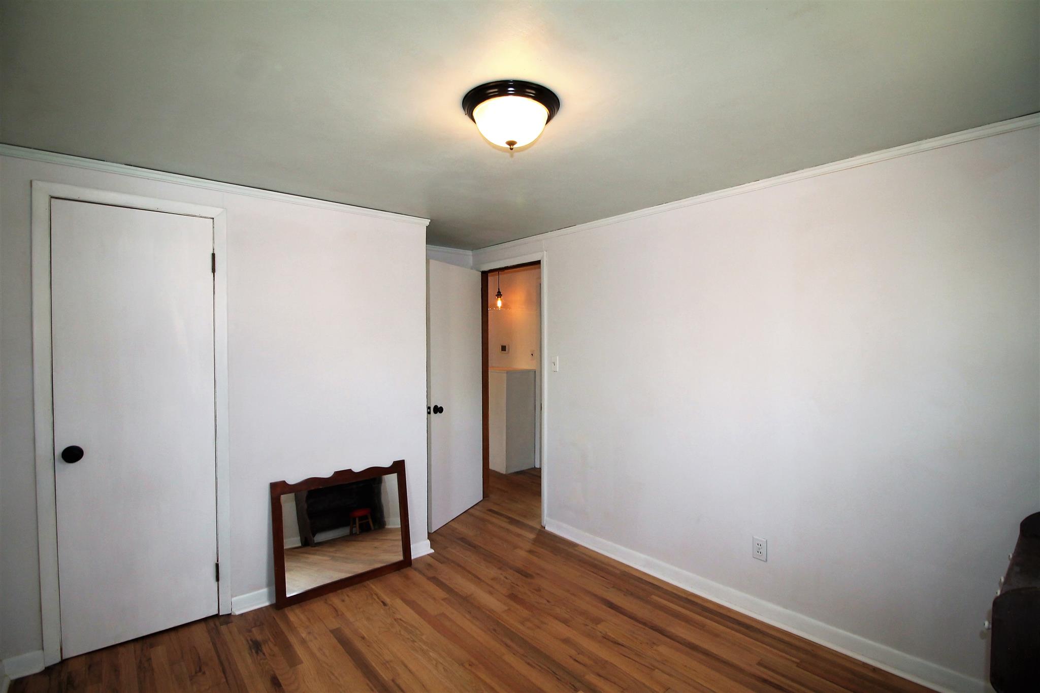 7205 Sleepy Hollow Road Fairview, TN 37062 - Photo 18 of 26 a view of empty room with wooden floor