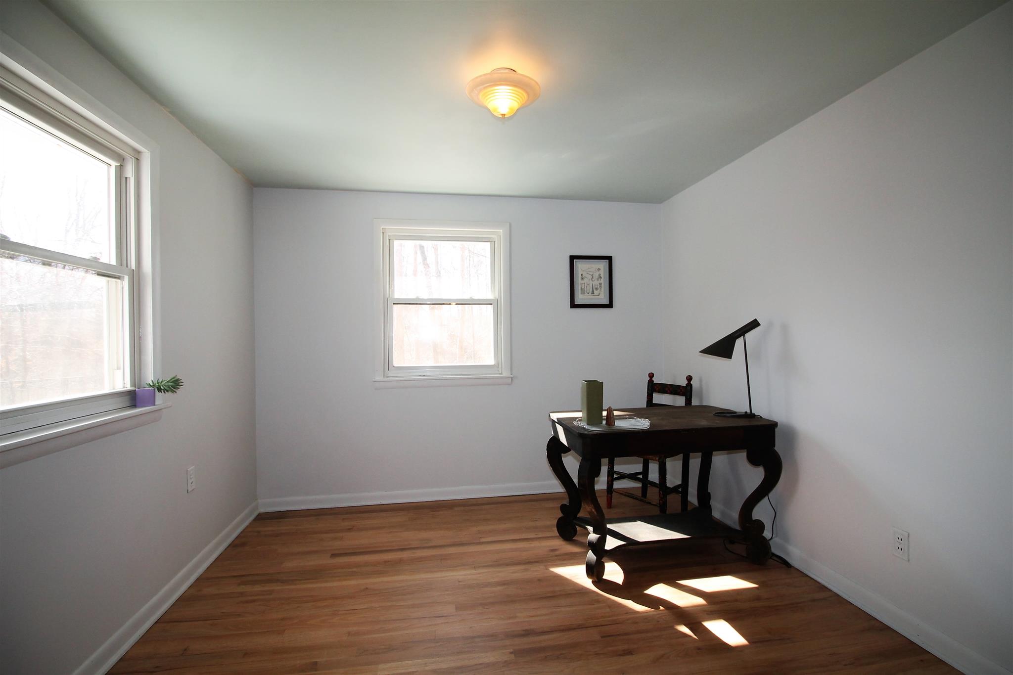 7205 Sleepy Hollow Road Fairview, TN 37062 - Photo 19 of 26 a view of a workspace with furniture and a window