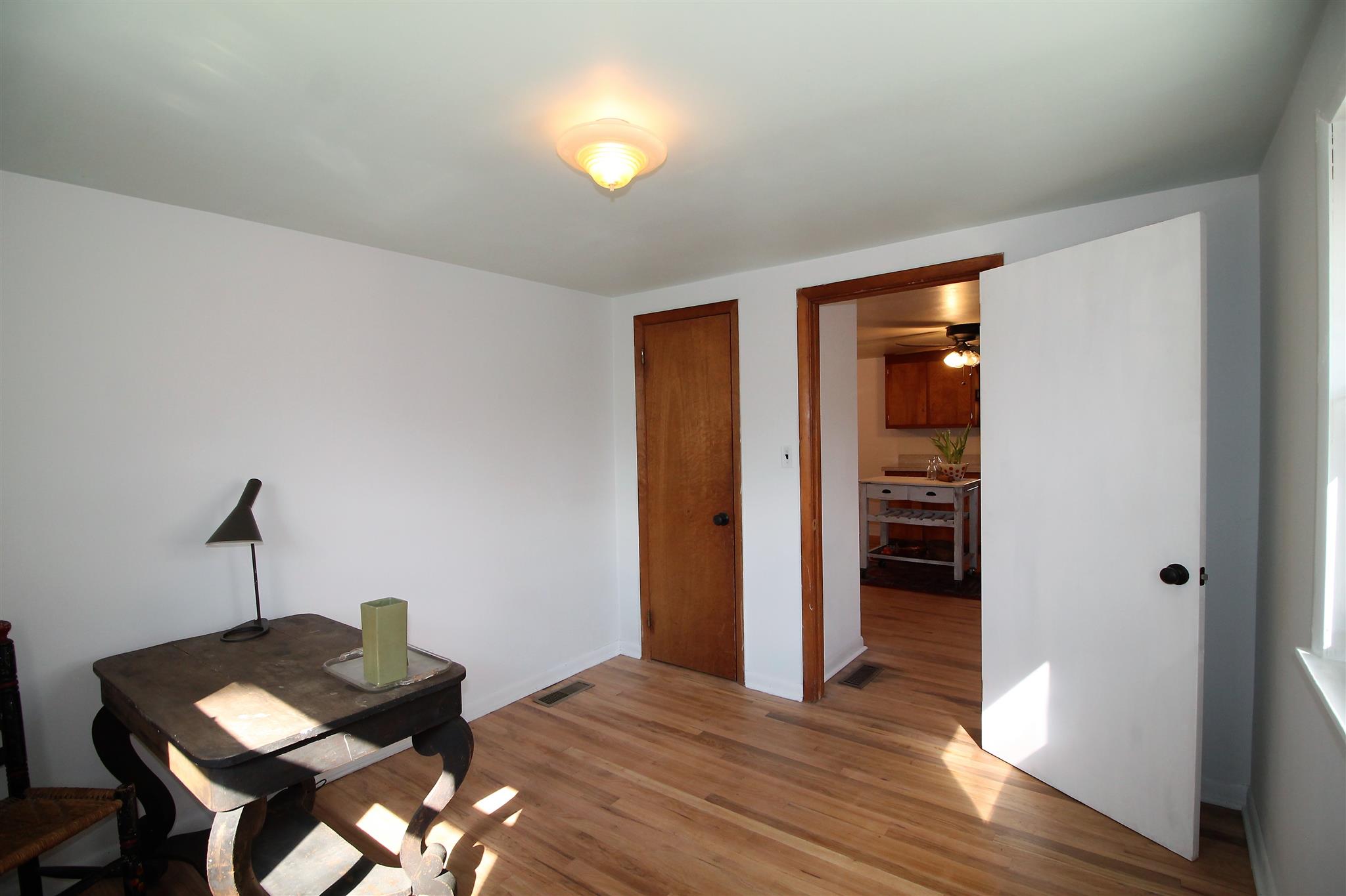 7205 Sleepy Hollow Road Fairview, TN 37062 - Photo 20 of 26 a view of a workspace with furniture and wooden floor