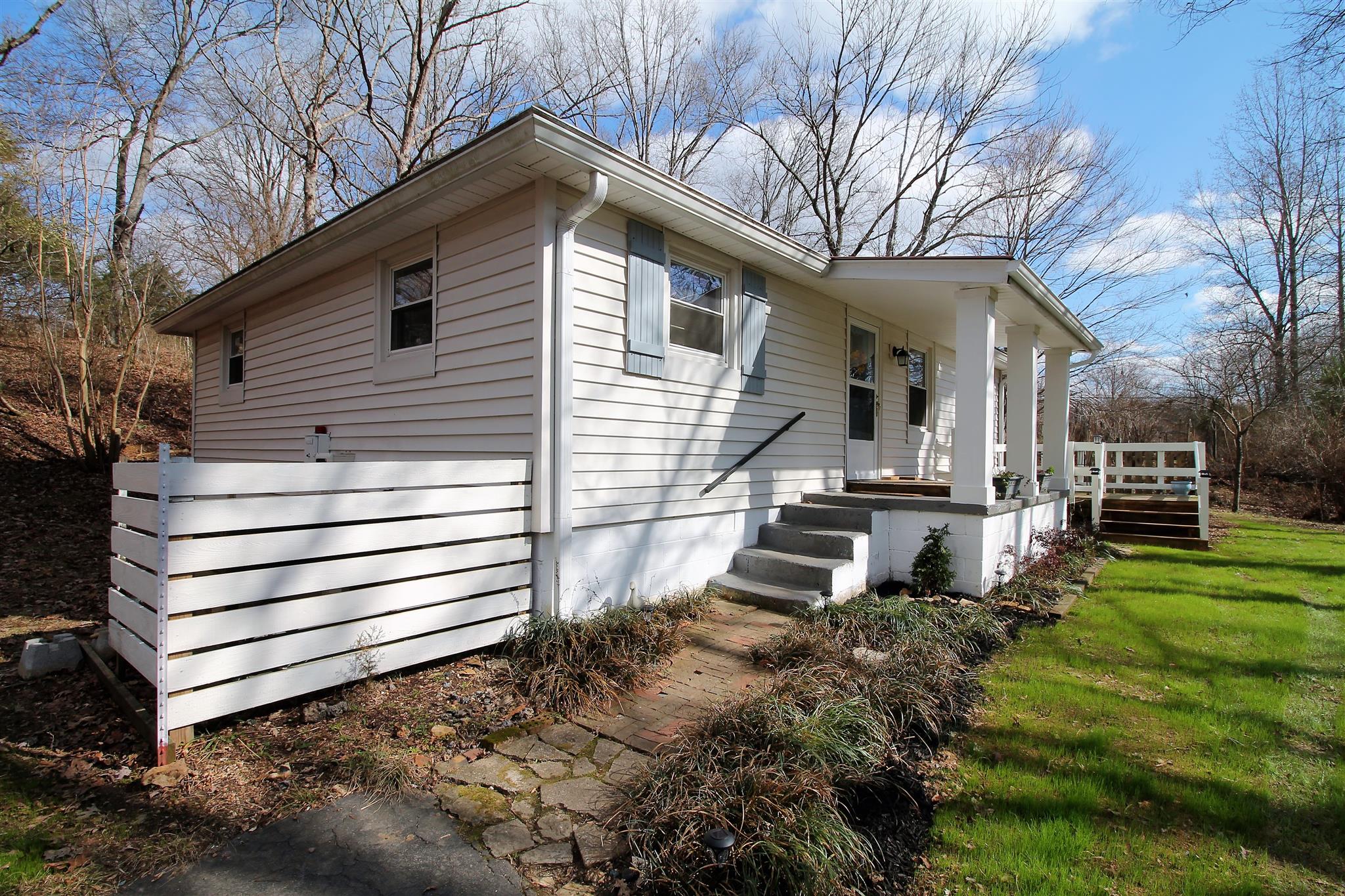7205 Sleepy Hollow Road Fairview, TN 37062 - Photo 3 of 26 a front view of a house with a yard