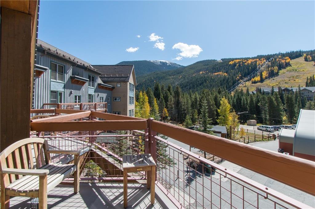 129 River Run Road, Unit 8061 Keystone, CO 80435 - Photo 10 of 19 a view of a balcony with two chairs and a table