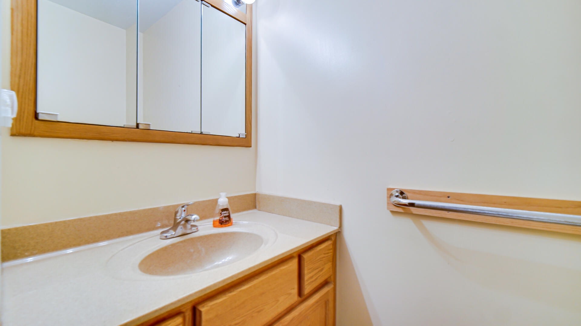 8135 South 600 East Monterey, IN 46960 - Photo 18 of 34 a bathroom with a sink and a mirror