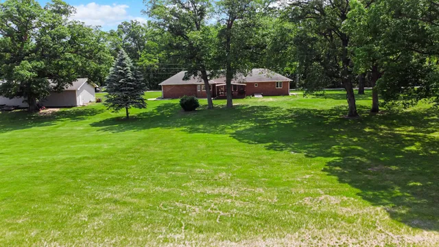 a view of a house with a big yard