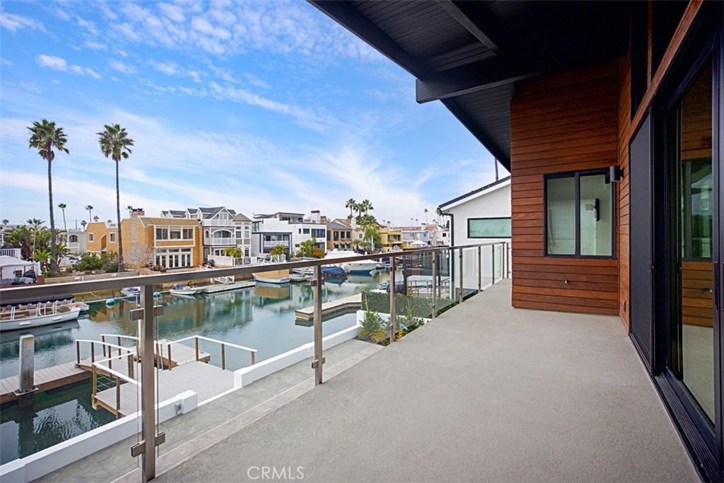4017 Channel, Unit B Newport Beach, CA 92663 - Photo 14 of 18 a view of a balcony with chairs