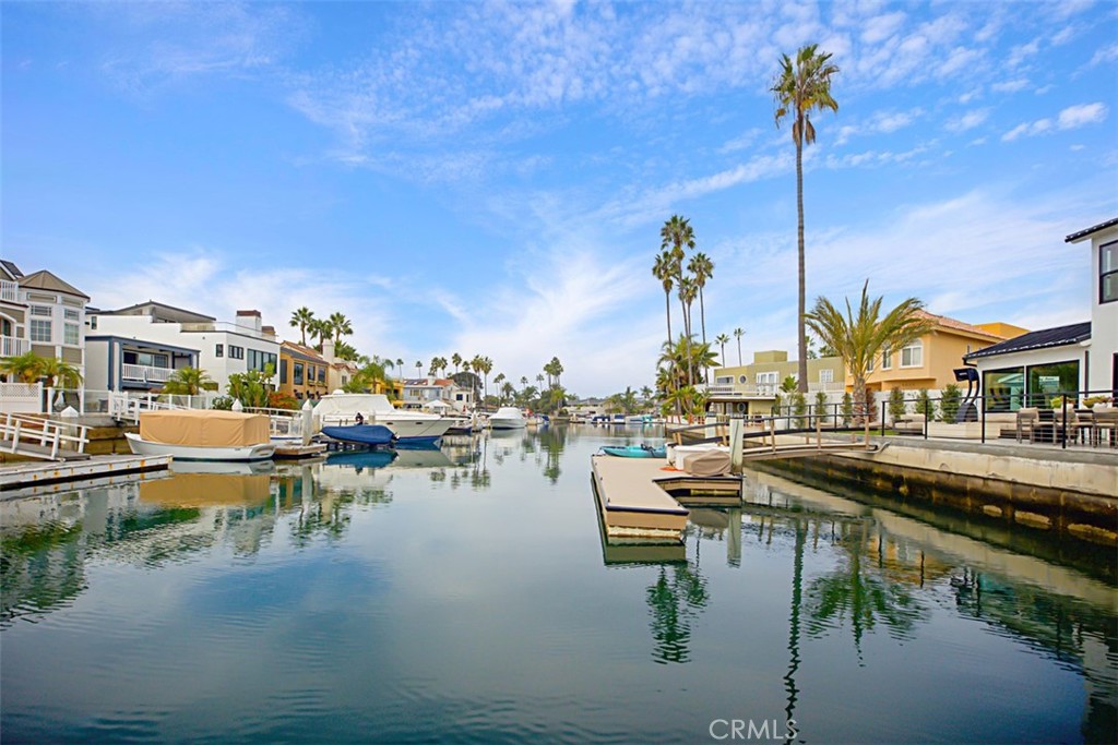 4017 Channel, Unit B Newport Beach, CA 92663 - Photo 16 of 18 a view of a lake with couches and city view