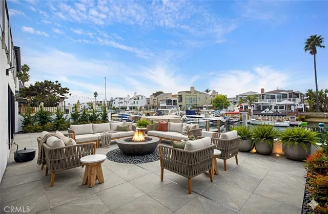 a view of a patio with couches and chairs