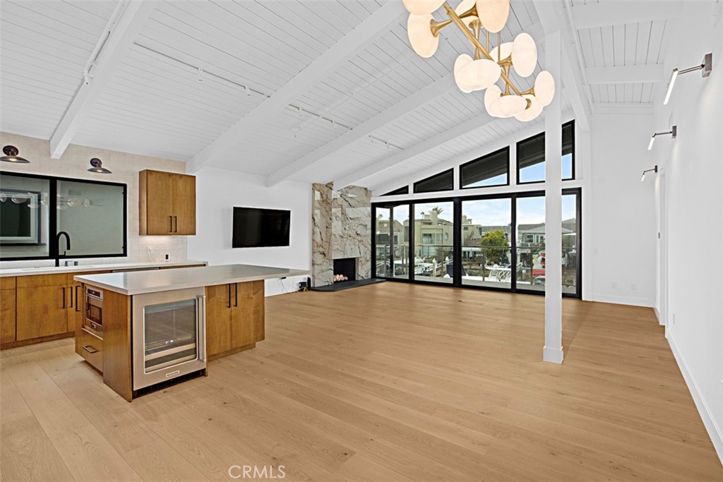 4017 Channel, Unit B Newport Beach, CA 92663 - Photo 4 of 18 a large white kitchen with a large window