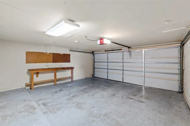 a view of a room with cabinets and stairs