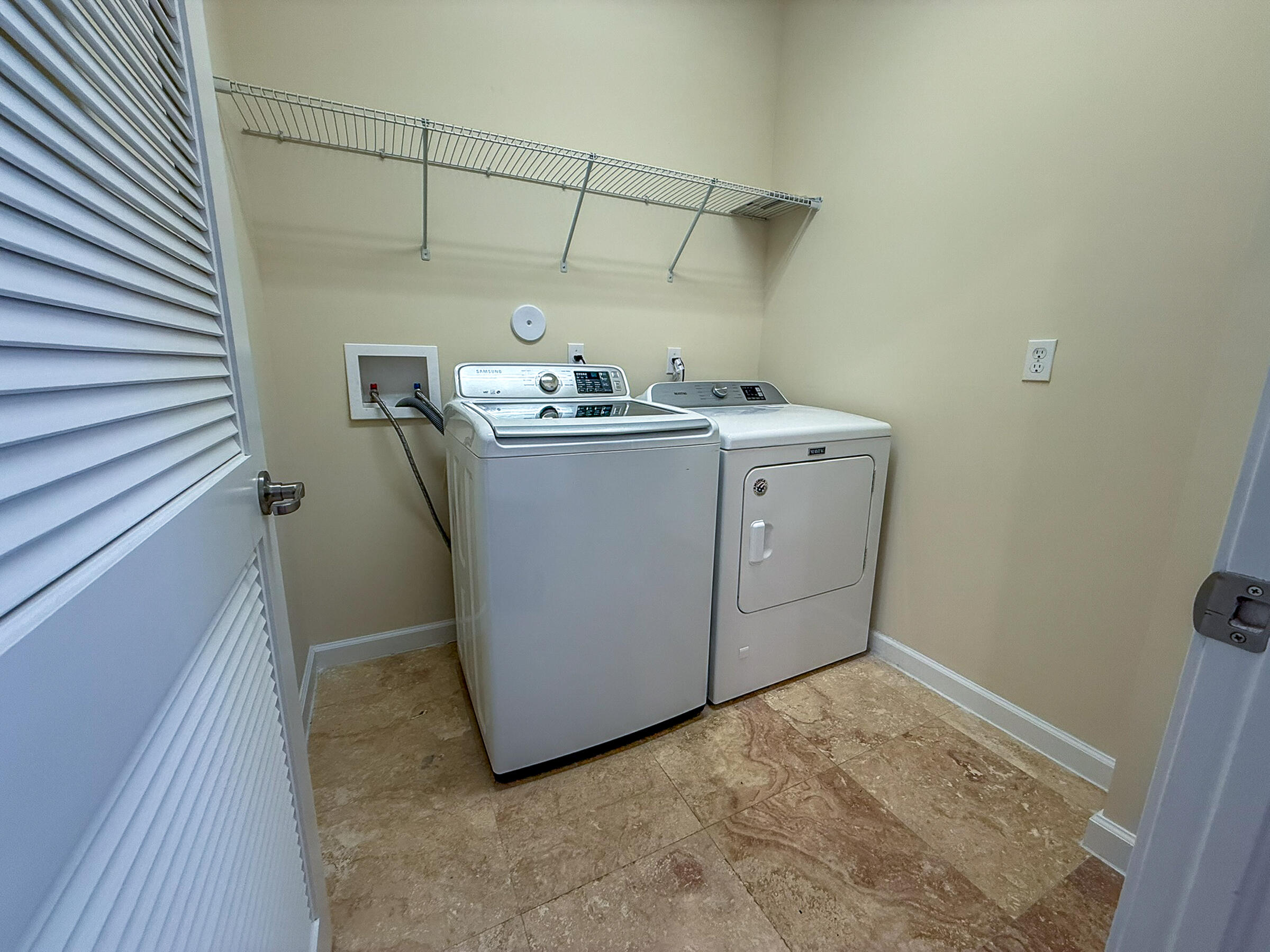 122 Northwest Gardner Street Boca Raton, FL 33432 - Photo 20 of 34 a utility room with dryer and washer