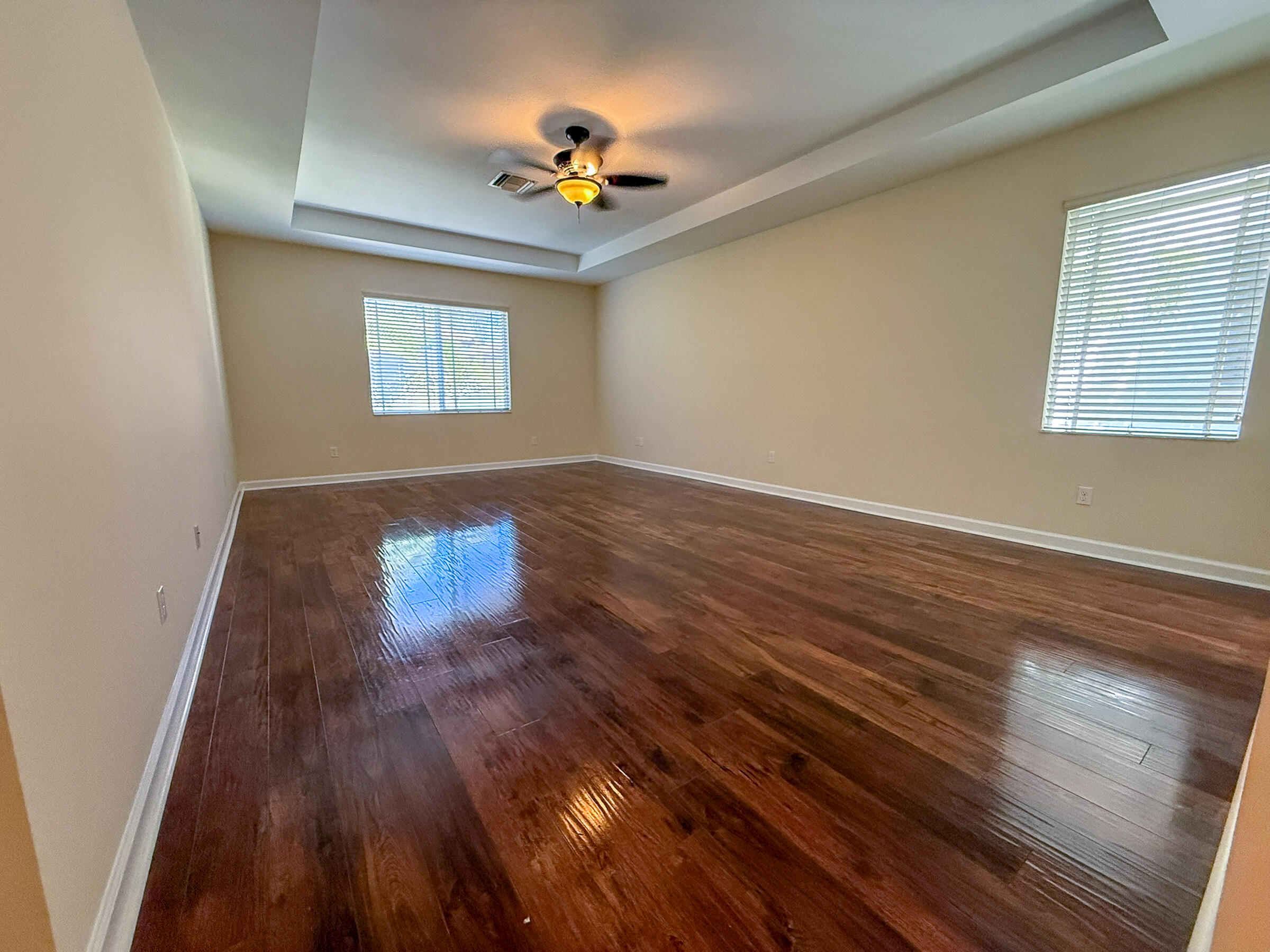 122 Northwest Gardner Street Boca Raton, FL 33432 - Photo 25 of 34 wooden floor in an empty room with a window