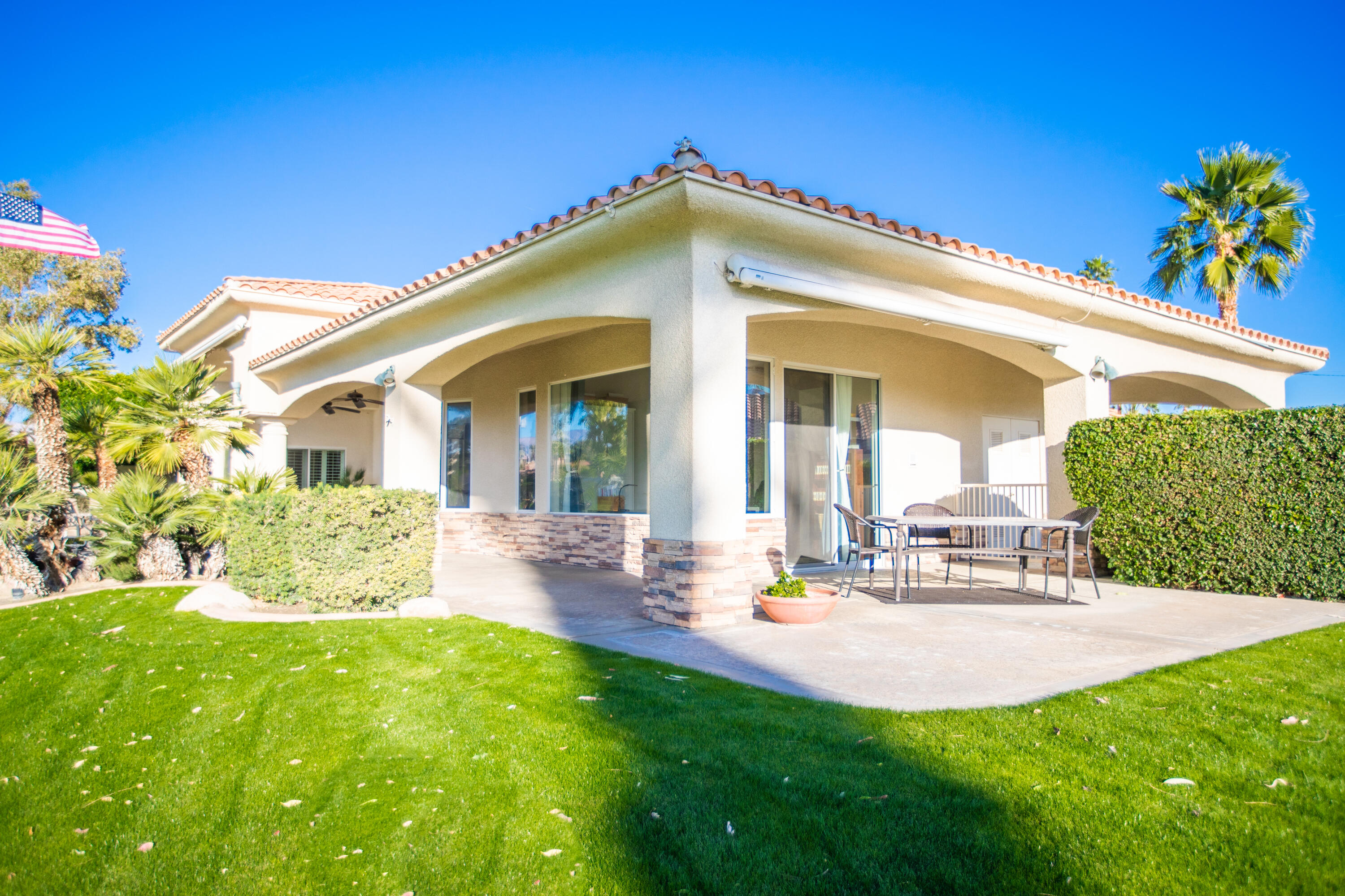 79740 Ryan Way Bermuda Dunes, CA 92203 - Photo 14 of 43 a view of a house with backyard porch and sitting area