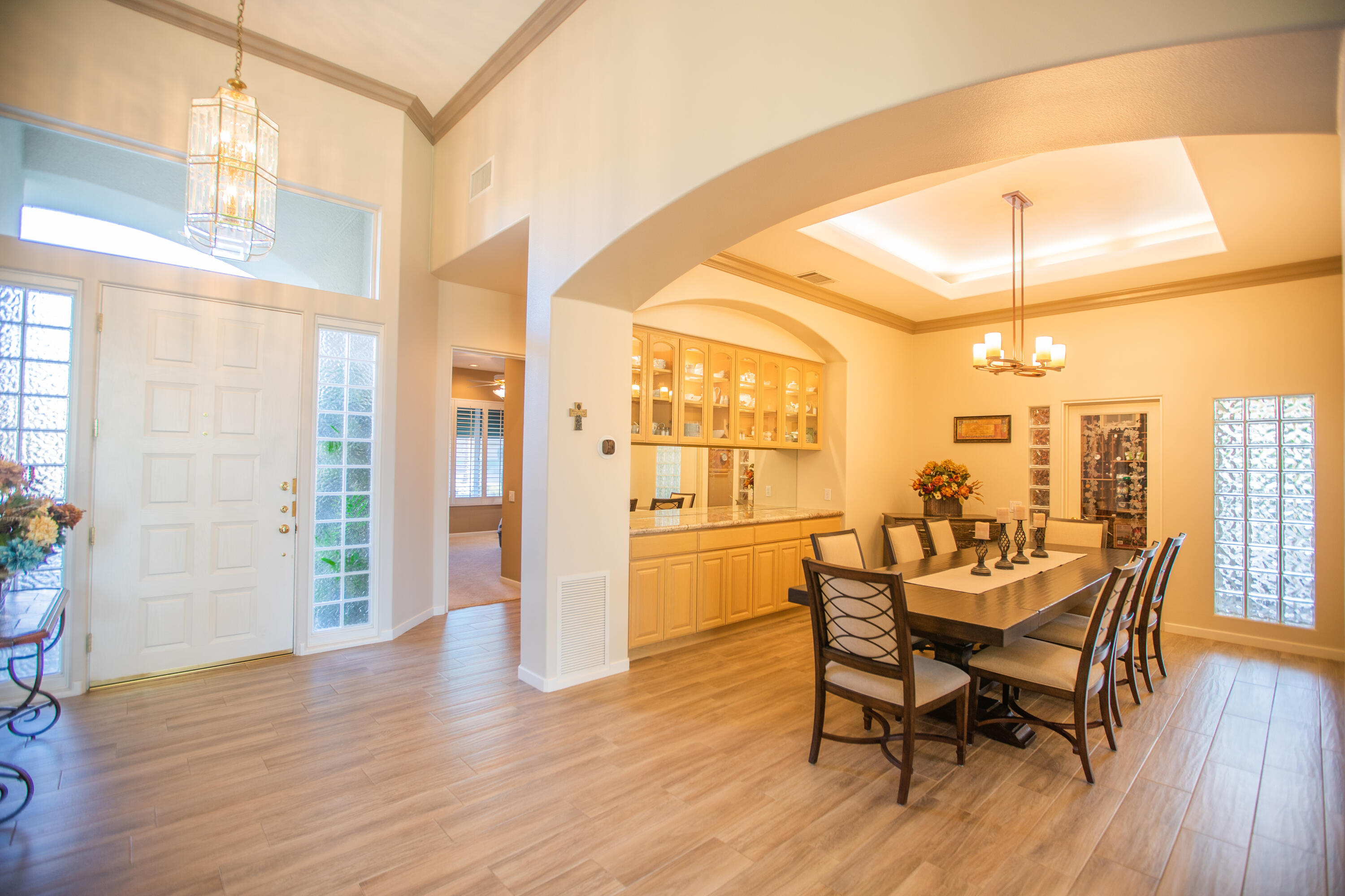 79740 Ryan Way Bermuda Dunes, CA 92203 - Photo 15 of 43 a view of a dining room with furniture and wooden floor