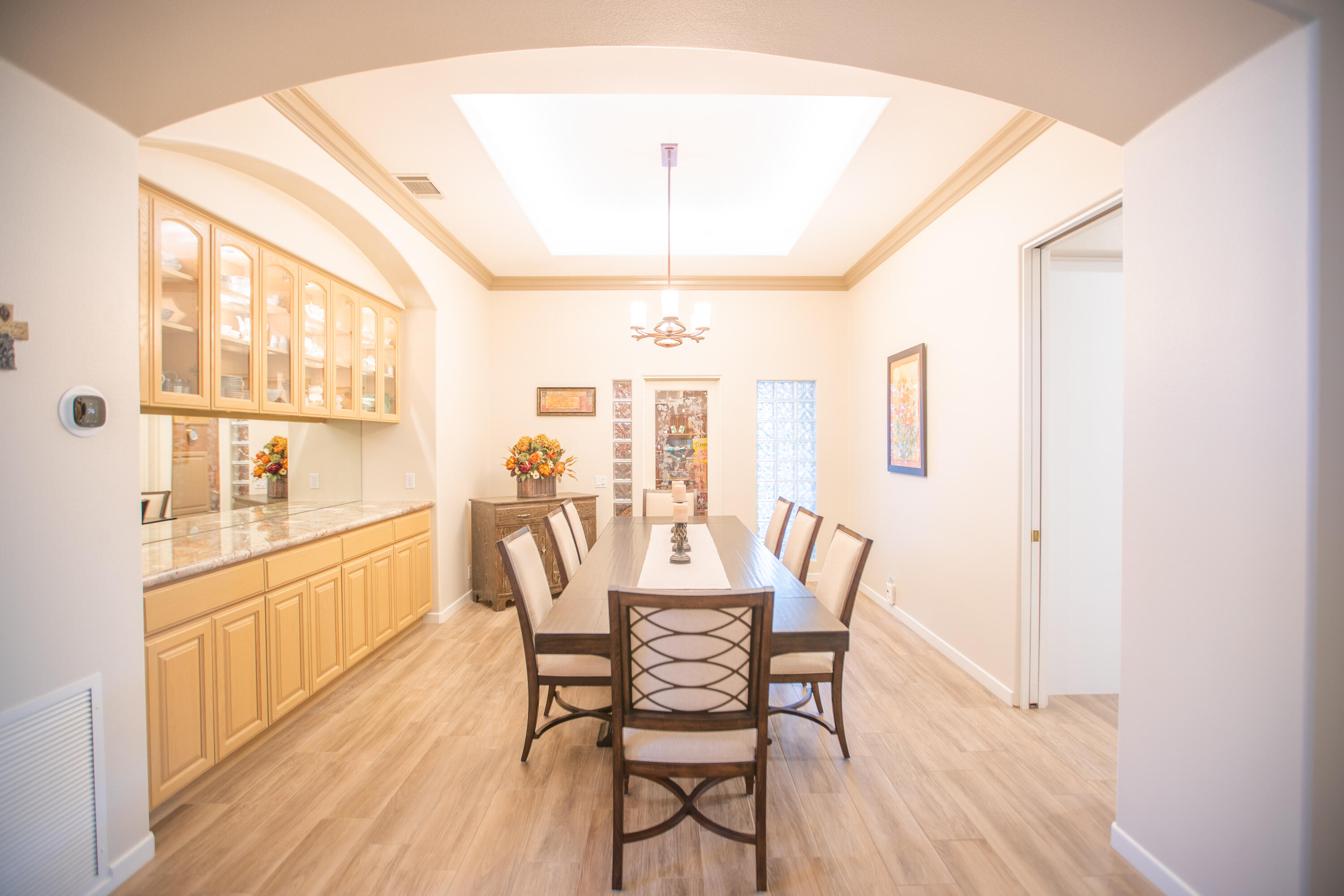 79740 Ryan Way Bermuda Dunes, CA 92203 - Photo 17 of 43 a view of a dining room with furniture window and wooden floor