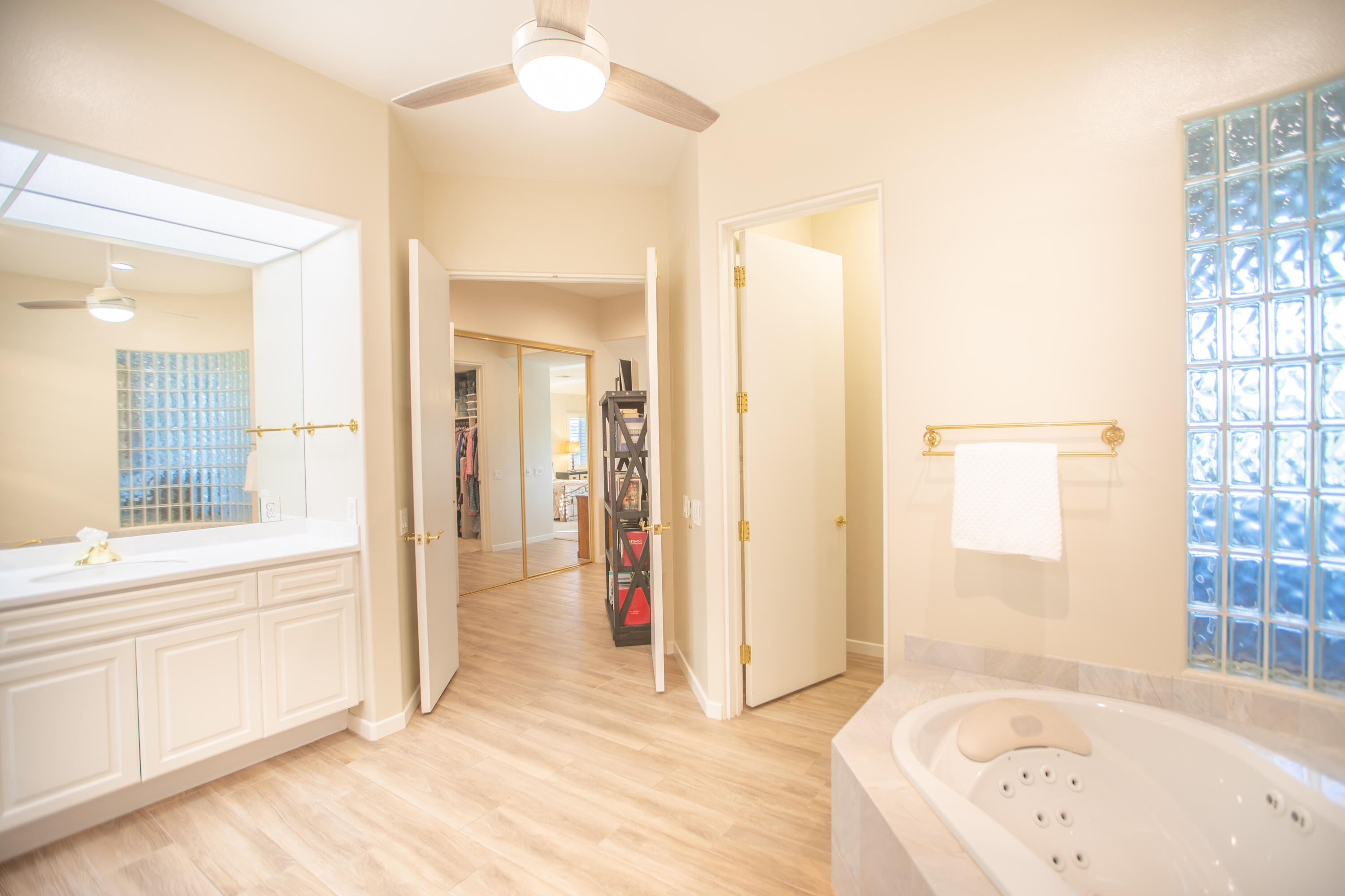 79740 Ryan Way Bermuda Dunes, CA 92203 - Photo 31 of 43 a bathroom with a bathtub and a shower