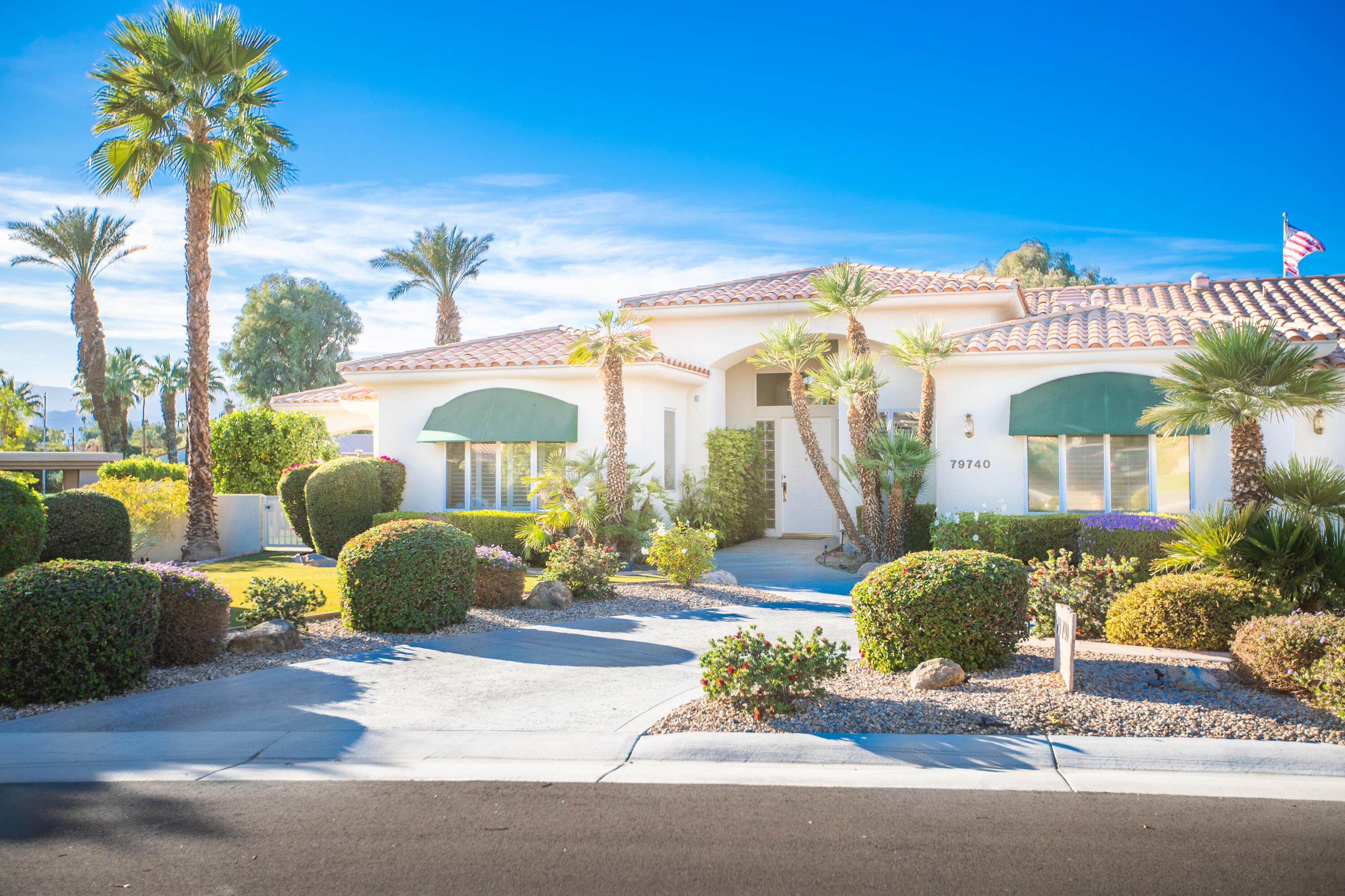 79740 Ryan Way Bermuda Dunes, CA 92203 - Photo 4 of 43 a front view of a building with garden