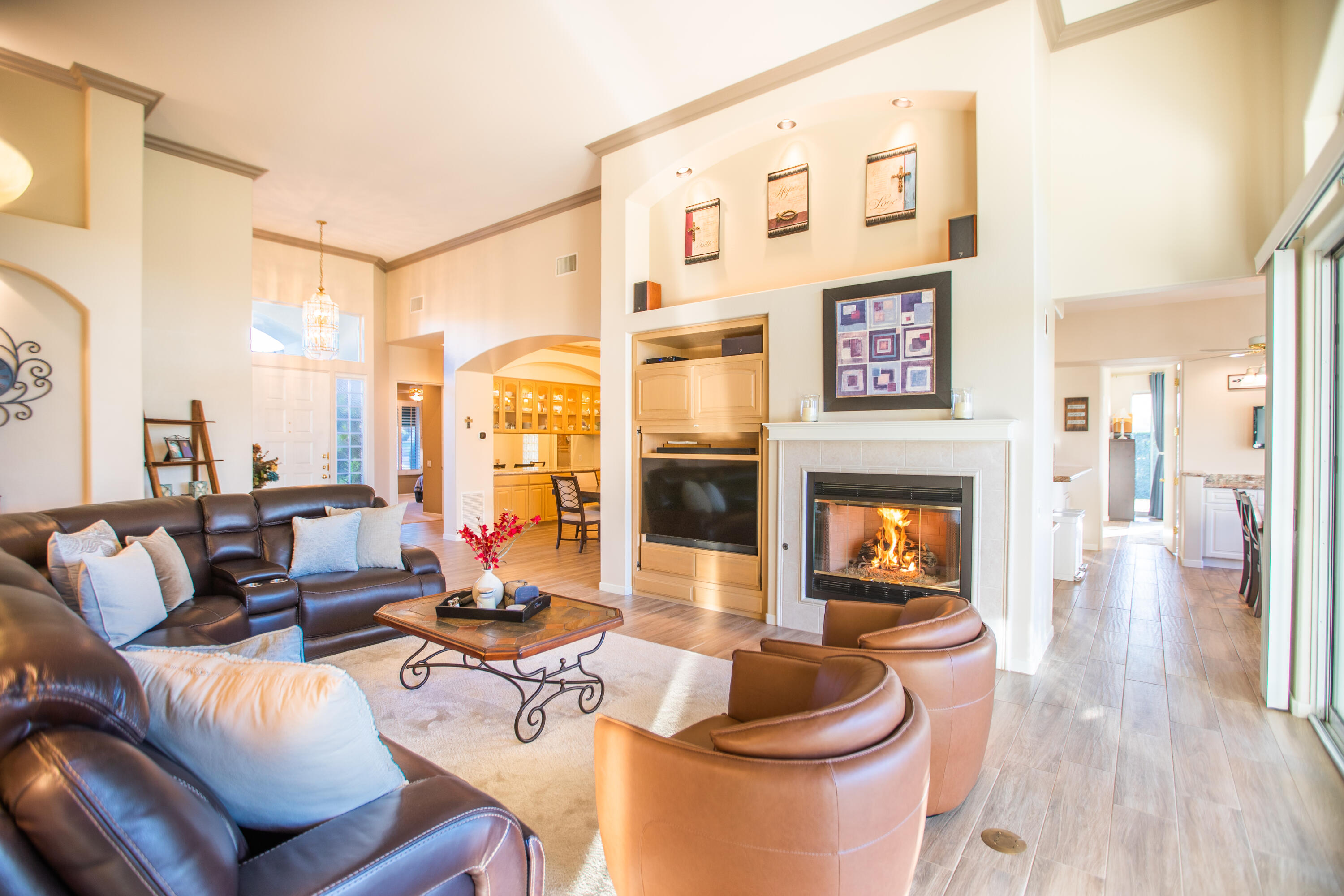 79740 Ryan Way Bermuda Dunes, CA 92203 - Photo 7 of 43 a living room with furniture and a fireplace