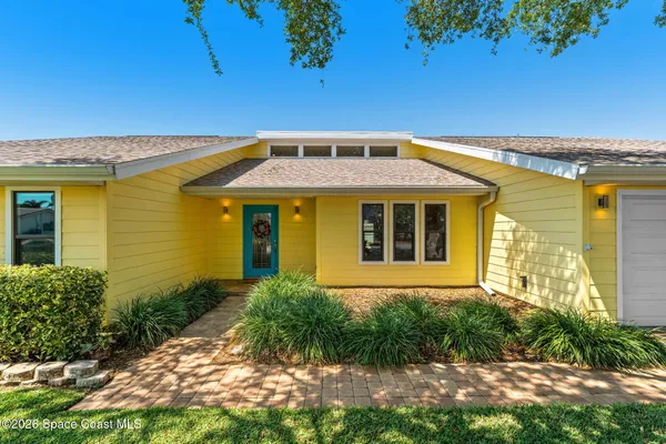 a living room with furniture and window