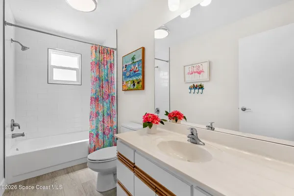 a view of a lake with a building in the background