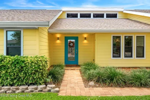 a front view of a house having yard