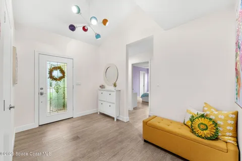 a living room with furniture and window