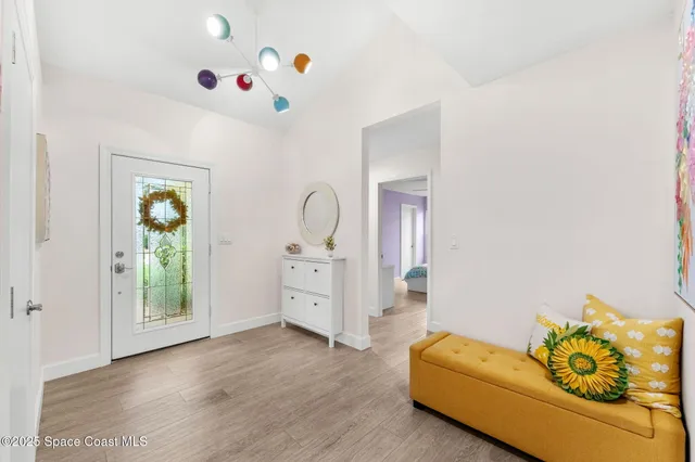 a living room with furniture and window