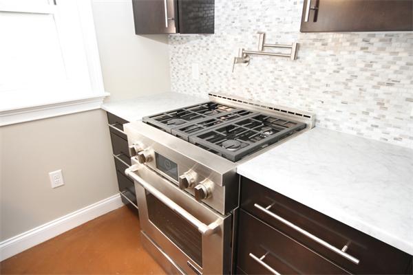9 North Margin Street Boston, MA 02113 - Photo 11 of 19 a close view of stove top oven