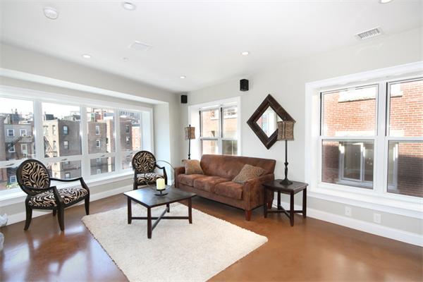 9 North Margin Street Boston, MA 02113 - Photo 3 of 19 a living room with furniture and a large window