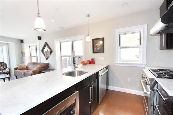 9 North Margin Street Boston, MA 02113 - Photo 9 of 19 a kitchen with sink stove and window