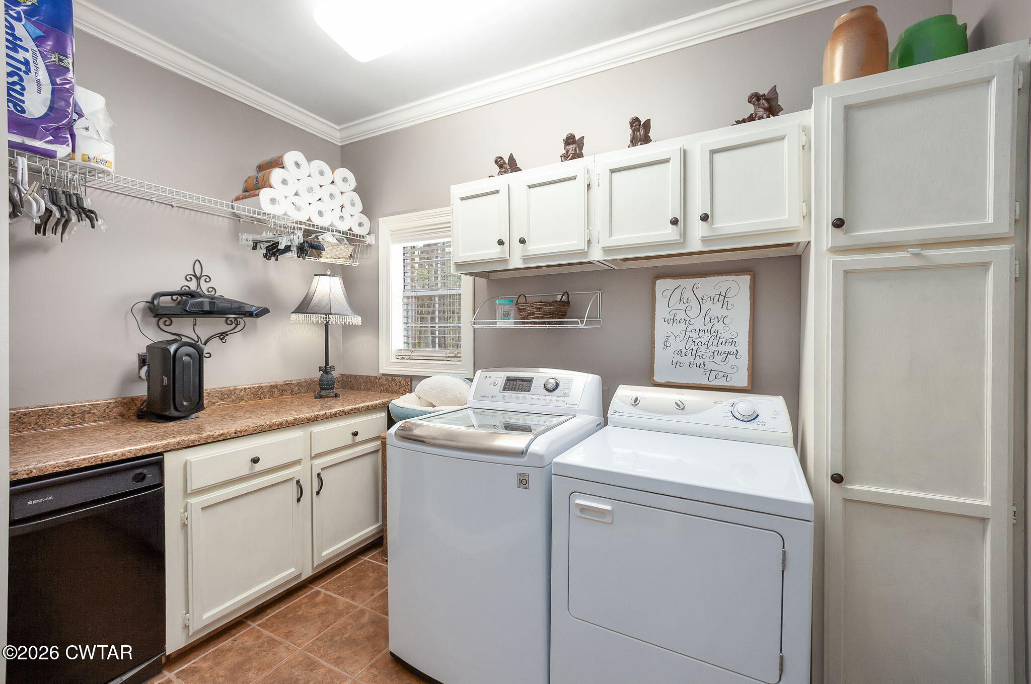 16 Fields Chase Jackson, TN 38305 - Photo 17 of 47 a utility room with cabinets washer and dryer