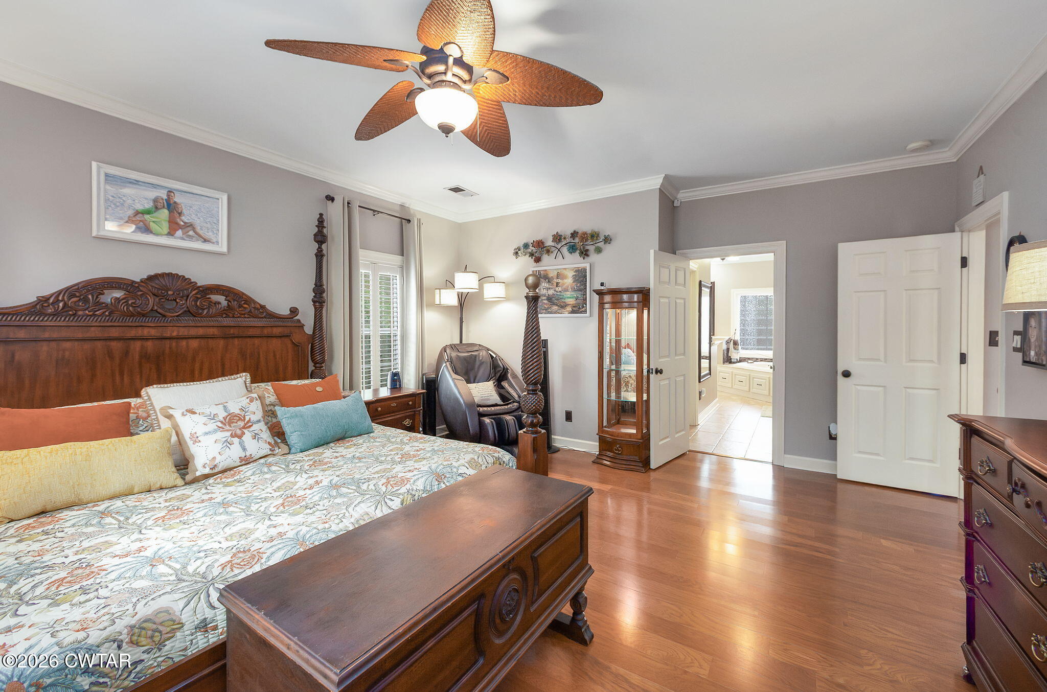 16 Fields Chase Jackson, TN 38305 - Photo 19 of 47 a bedroom with a bed and a chandelier