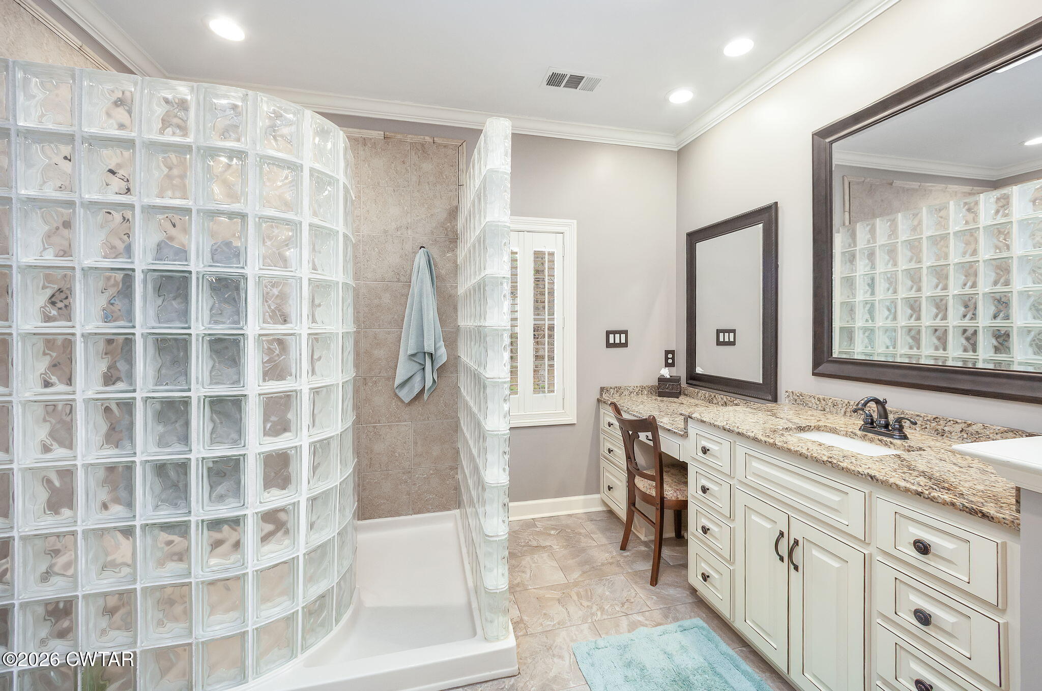 16 Fields Chase Jackson, TN 38305 - Photo 20 of 47 a spacious bathroom with a granite countertop double vanity sink a mirror and a shower
