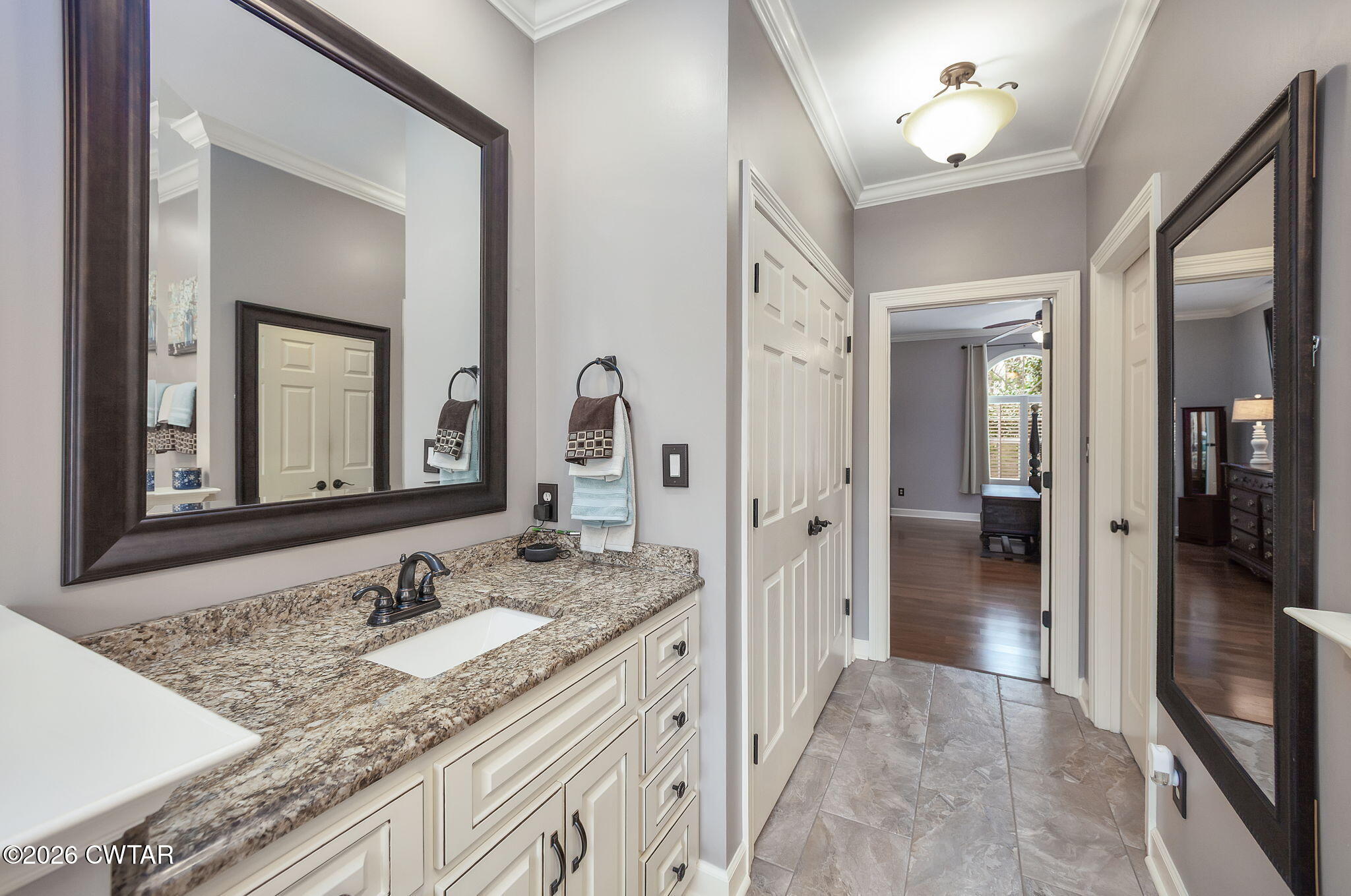 16 Fields Chase Jackson, TN 38305 - Photo 22 of 47 a en suite bathroom with a granite countertop sink and a mirror