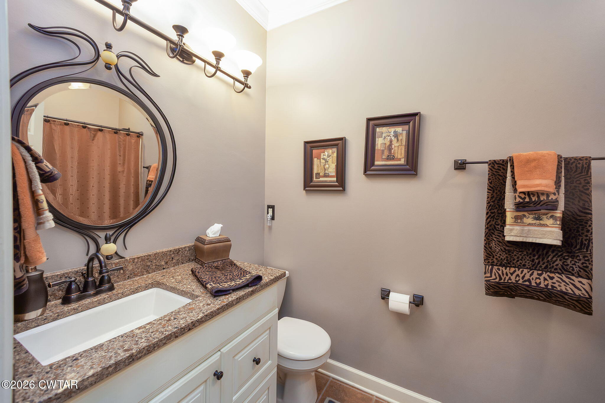 16 Fields Chase Jackson, TN 38305 - Photo 25 of 47 a bathroom with a granite countertop toilet a sink and a mirror
