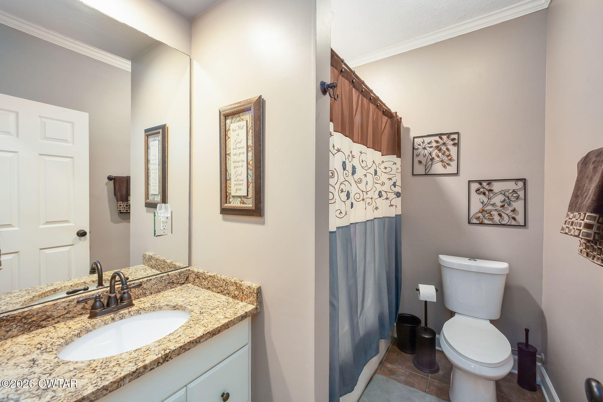16 Fields Chase Jackson, TN 38305 - Photo 40 of 47 a bathroom with a granite countertop toilet sink and a mirror