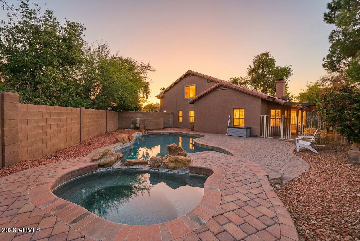 17002 South 34th Place Phoenix, AZ 85048 - Photo 24 of 27 a view of a house with backyard