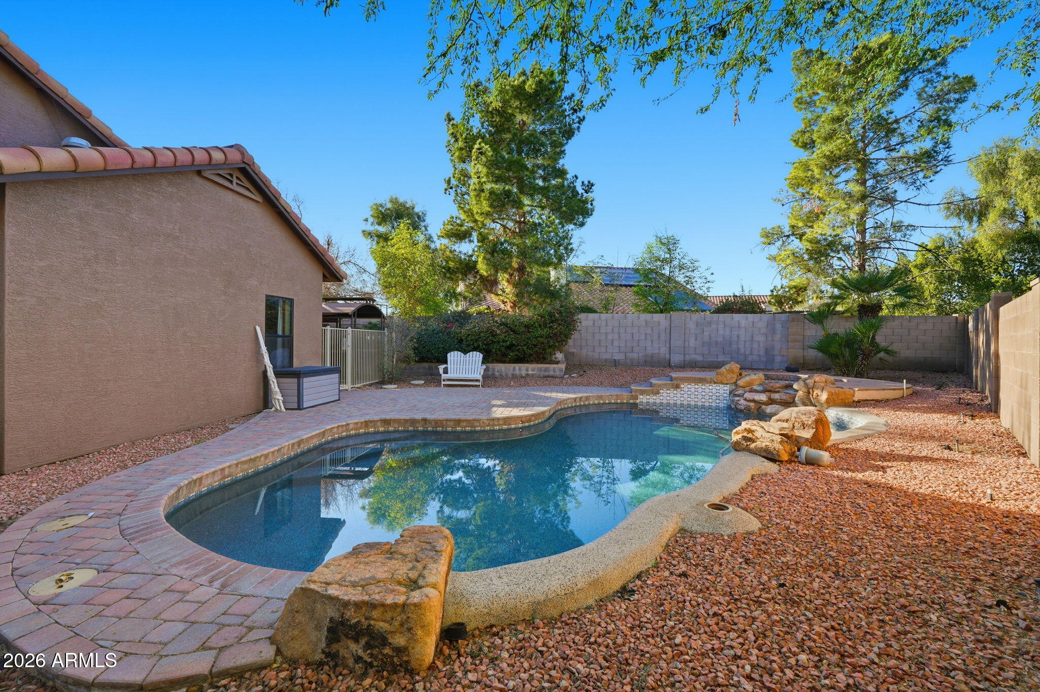 17002 South 34th Place Phoenix, AZ 85048 - Photo 26 of 27 a view of a swimming pool with a patio