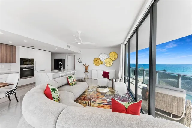 a view of a balcony with an ocean view