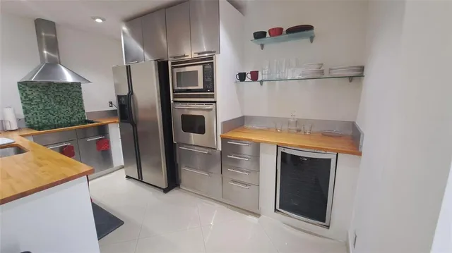 a room with furniture and a large window