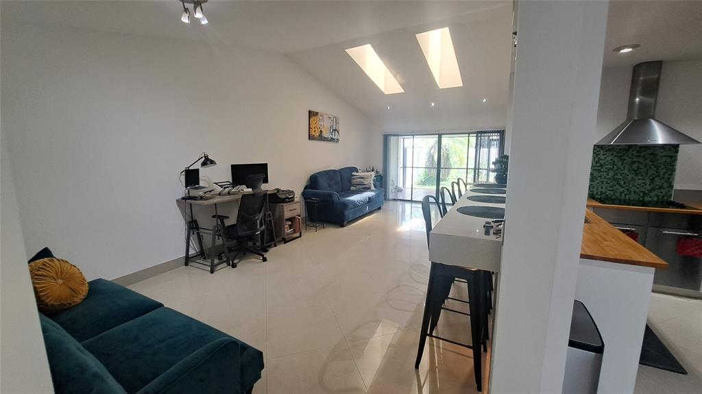 4519 Feivel Road, Unit 46 West Palm Beach, FL 33417 - Photo 14 of 56 a room with furniture and a window