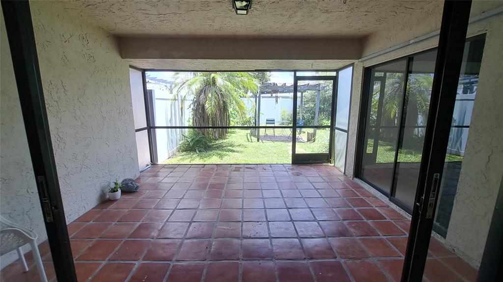 4519 Feivel Road, Unit 46 West Palm Beach, FL 33417 - Photo 18 of 56 a view of empty room with windows