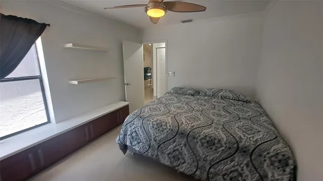 a spacious bathroom with a double vanity sink and a mirror